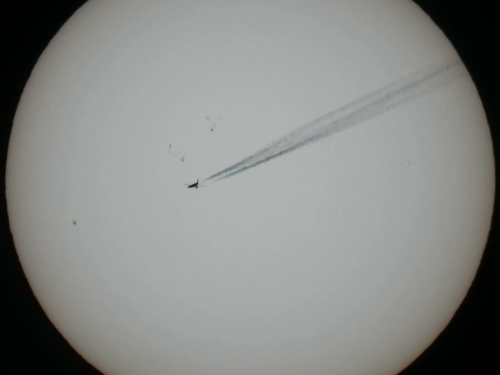 Video: a plane crossing the sun