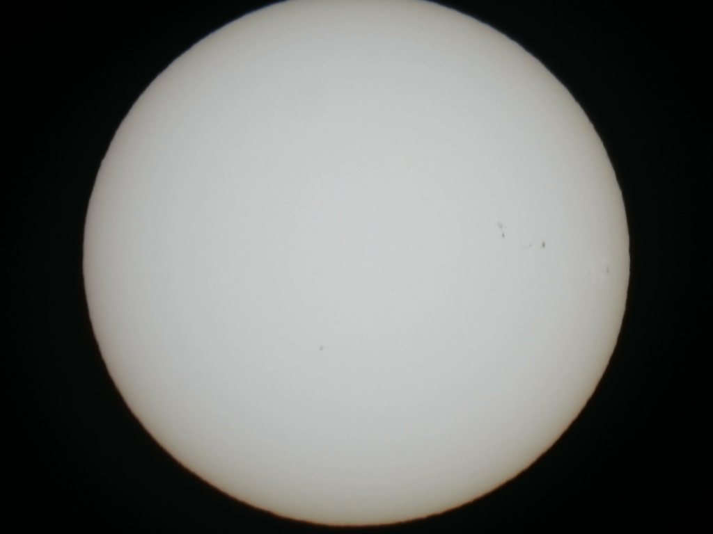 Video: a plane crossing the sun